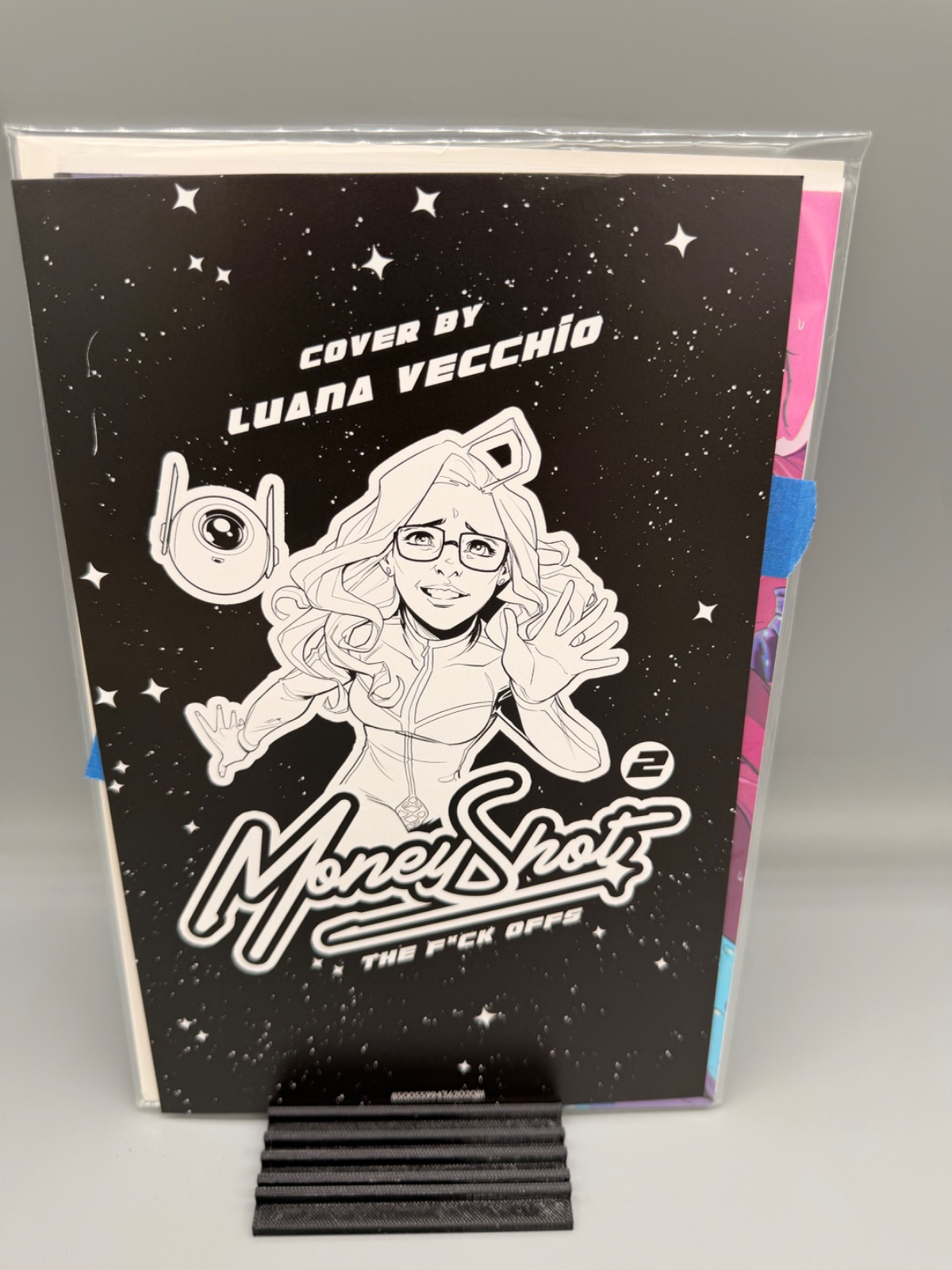 MONEY SHOT THE F* OFFS #2 (OF 5) CVR H LUANA VECCHIO NSFW BLACK BAG FULL ART VAR (MR) — Actual book · photo 1