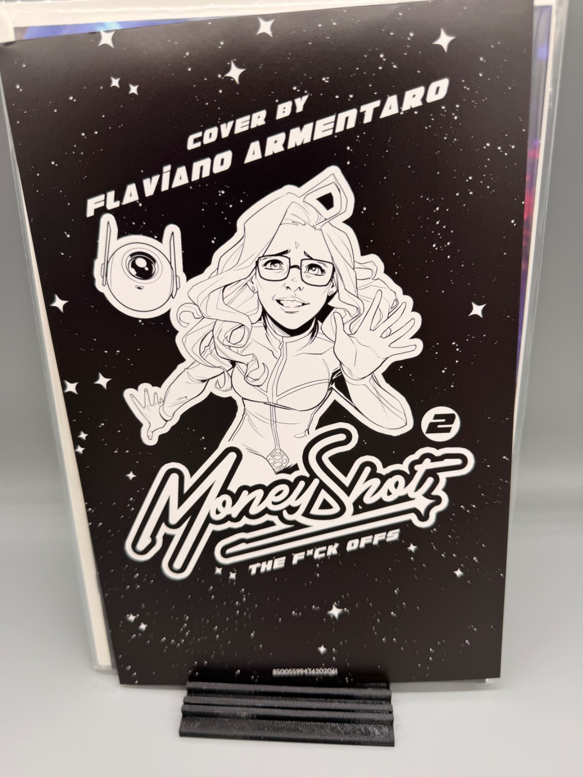 MONEY SHOT THE F* OFFS #2 (OF 5) CVR F FLAVIANO AREMENTARO NSFW BLACK BAG FULL ART VAR (MR) — Actual book · photo 1